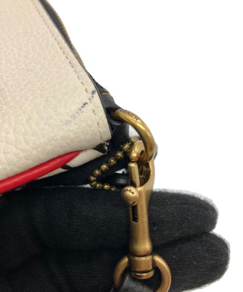 COACH（コーチ）COACH (コーチ) MICKEY MOUSE (ミッキーマウス) Keith Haring (キースヘリング) スモールリストレット ホワイトの古着・服飾アイテム