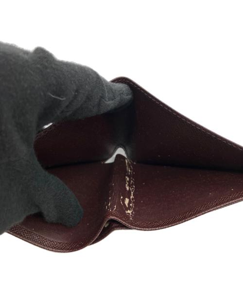 LOUIS VUITTON（ルイ ヴィトン）LOUIS VUITTON (ルイ ヴィトン) タイガ2つ折り財布 ブラウンの古着・服飾アイテム