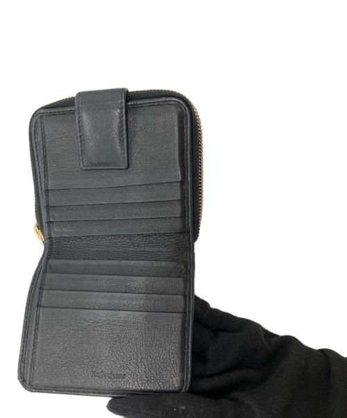 Yves Saint Laurent（イヴサンローラン）Yves Saint Laurent (イヴサンローラン) 2つ折り財布 ブラックの古着・服飾アイテム