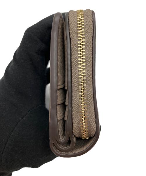 TORY BURCH（トリーバーチ）TORY BURCH (トリーバーチ) 2つ折り財布 ベージュの古着・服飾アイテム