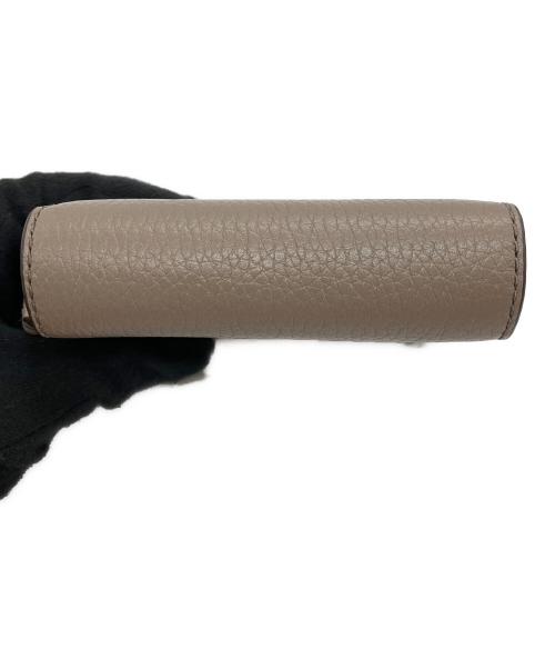 TORY BURCH（トリーバーチ）TORY BURCH (トリーバーチ) 2つ折り財布 ベージュの古着・服飾アイテム