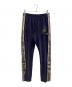 Needles（ニードルズ）の古着「Narrow Track Pant」｜パープル