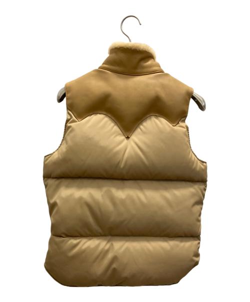 RockyMountainFeatherBed（ロッキーマウンテンフェザーベッド）RockyMountainFeatherBed (ロッキーマウンテンフェザーベッド) レザーヨークダウンベスト ベージュ サイズ:7/8 (SIZE S)の古着・服飾アイテム