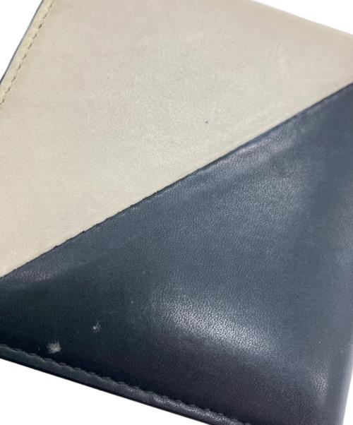 Saint Laurent Paris（サンローランパリ）Saint Laurent Paris (サンローランパリ) ジェイミーフォールドウォレット ブラック×ホワイトの古着・服飾アイテム