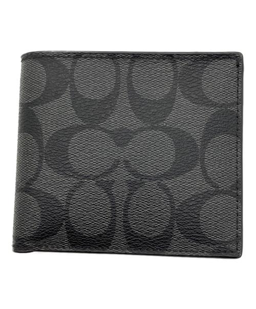 COACH（コーチ）COACH (コーチ) シグネチャー　2つ折り財布 ブラックの古着・服飾アイテム
