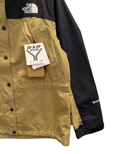 THE NORTH FACE（ザ ノース フェイス）THE NORTH FACE (ザ ノース フェイス) マウンテンライトジャケット ブラック×クラシックカーキ サイズ:Ｌ 未使用品の古着・服飾アイテム