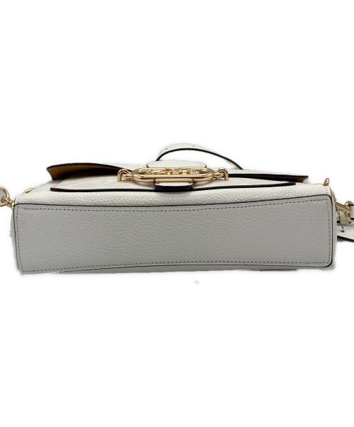 COACH（コーチ）COACH (コーチ) ぺブルレザー コーティングキャンバス シグネチャー  ホワイトの古着・服飾アイテム