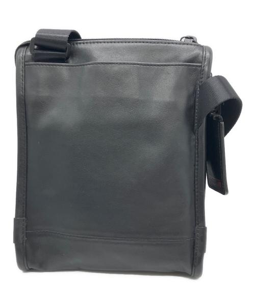 TUMI（トゥミ）TUMI (トゥミ) レザーショルダーバッグ ブラックの古着・服飾アイテム