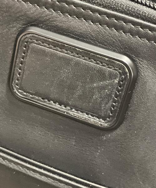TUMI（トゥミ）TUMI (トゥミ) レザーショルダーバッグ ブラックの古着・服飾アイテム