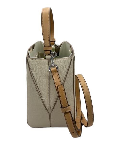 TORY BURCH（トリーバーチ）TORY BURCH (トリーバーチ) マックグロー Tモノグラム スモールバケットバッグ ベージュの古着・服飾アイテム