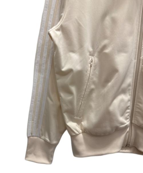 adidas（アディダス）adidas (アディダス) トラックジャケット　クラシックス ファイヤーバード アイボリー サイズ:Ｌの古着・服飾アイテム