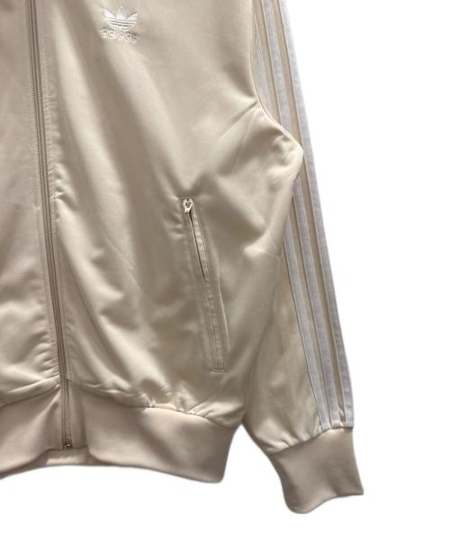 adidas（アディダス）adidas (アディダス) トラックジャケット　クラシックス ファイヤーバード アイボリー サイズ:Ｌの古着・服飾アイテム