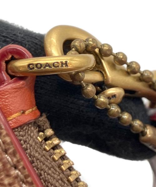 COACH（コーチ）COACH (コーチ) レキシー ホリデー　携帯ポーチ ブラウンの古着・服飾アイテム