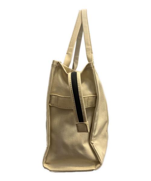 Marc by Marc Jacobs（マークバイマークジェイコブス）Marc by Marc Jacobs (マークバイマークジェイコブス) ザキャンバスラージ アイボリーの古着・服飾アイテム