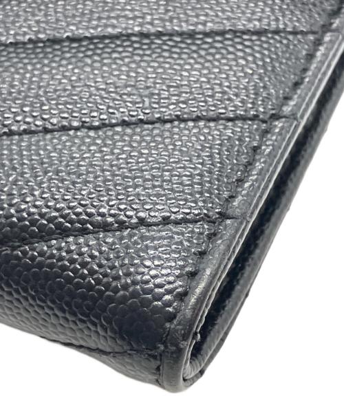 Saint Laurent Paris（サンローランパリ）Saint Laurent Paris (サンローランパリ) ラージフラップ Vステッチ 長財布 ブラックの古着・服飾アイテム