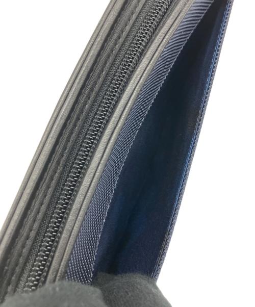 TUMI（トゥミ）TUMI (トゥミ) SOPHNET. (ソフネット) 長財布 ネイビー×ブラックの古着・服飾アイテム