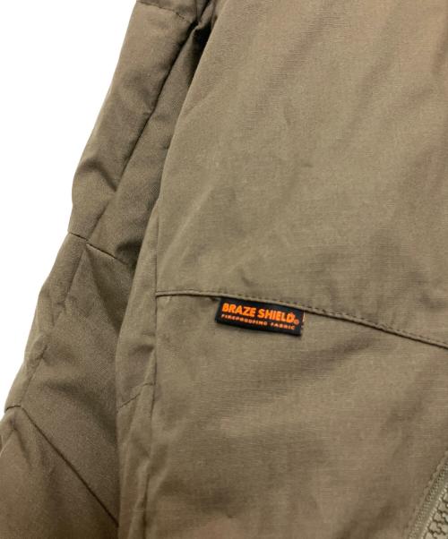 GRIP SWANY（グリップスワニー）GRIP SWANY (グリップスワニー) ファイアプルーフダウンジャケット カーキ サイズ:Lの古着・服飾アイテム