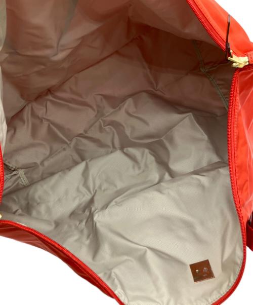 TUMI（トゥミ）TUMI (トゥミ) JUST IN CASE レッドの古着・服飾アイテム