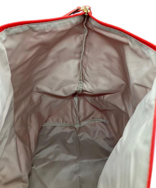 TUMI（トゥミ）TUMI (トゥミ) JUST IN CASE レッドの古着・服飾アイテム