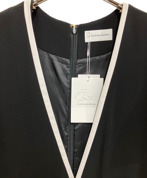 La boutique BonBon（ラブティックボンボン）La boutique BonBon (ラブティックボンボン) ダブルクロスバイカラーラッフルジャンドレ ブラック サイズ:M 未使用品の古着・服飾アイテム