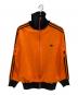 OLD adidas（オールドアディダス）の古着「トラックジャケット」｜オレンジ×ブラック