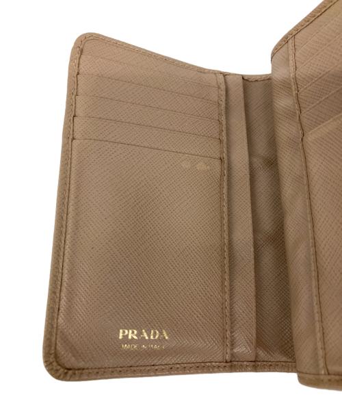 PRADA（プラダ）PRADA (プラダ) コンパクトウォレット ピンクの古着・服飾アイテム