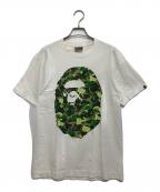 A BATHING APE×KAWSアベイシングエイプ×カウズ）の古着「Tシャツ」｜ホワイト
