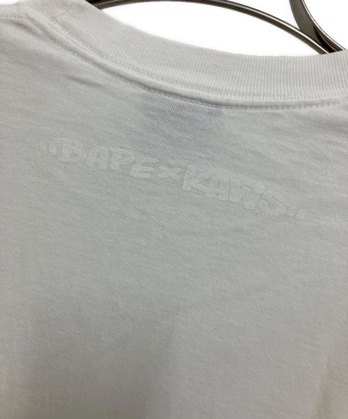 A BATHING APE（アベイシングエイプ）A BATHING APE (アベイシングエイプ) KAWS (カウズ) Tシャツ ホワイト サイズ:Mの古着・服飾アイテム