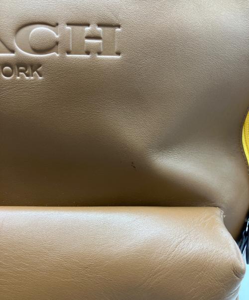COACH（コーチ）COACH (コーチ) PAC-MAN (パックマン) リュック ブラウンの古着・服飾アイテム