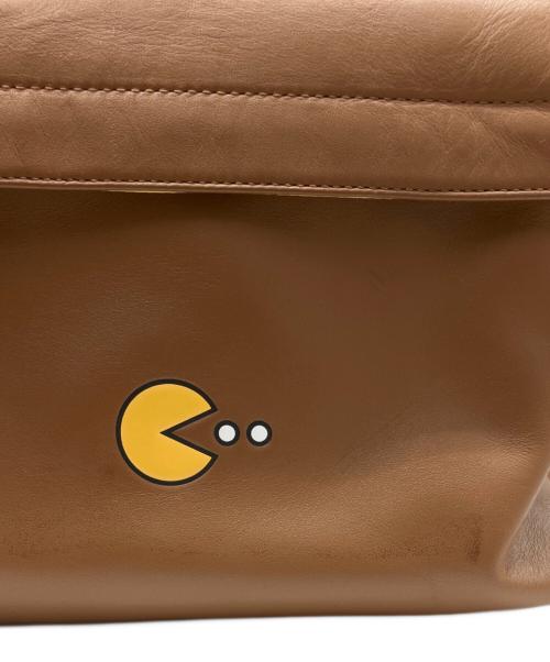 COACH（コーチ）COACH (コーチ) PAC-MAN (パックマン) リュック ブラウンの古着・服飾アイテム