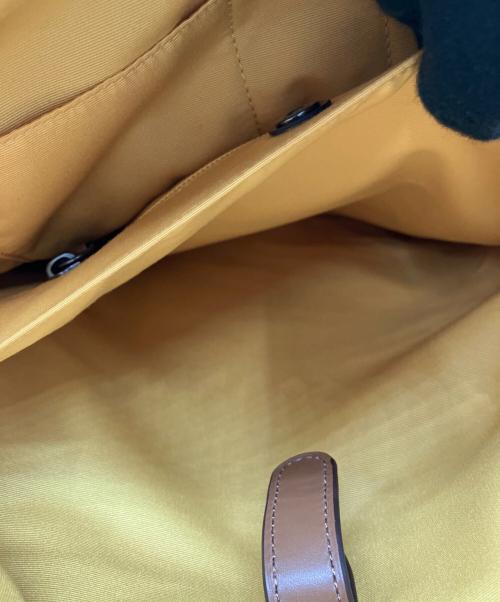 COACH（コーチ）COACH (コーチ) PAC-MAN (パックマン) リュック ブラウンの古着・服飾アイテム