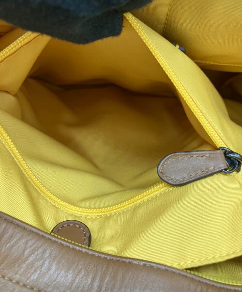 COACH（コーチ）COACH (コーチ) PAC-MAN (パックマン) リュック ブラウンの古着・服飾アイテム