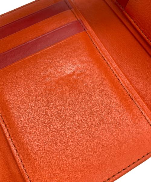 Vivienne Westwood（ヴィヴィアンウエストウッド）Vivienne Westwood (ヴィヴィアンウエストウッド) 3つ折りがま口財布 オレンジの古着・服飾アイテム