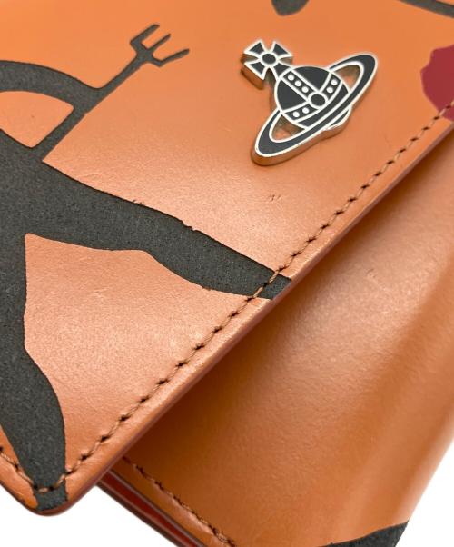 Vivienne Westwood（ヴィヴィアンウエストウッド）Vivienne Westwood (ヴィヴィアンウエストウッド) 3つ折りがま口財布 オレンジの古着・服飾アイテム