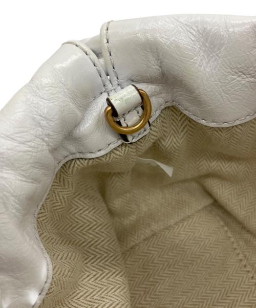 TORY BURCH（トリーバーチ）TORY BURCH (トリーバーチ) Willa Glazed Drawstring Bag ホワイトの古着・服飾アイテム