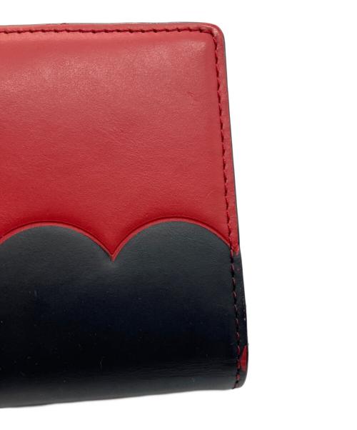 Kate Spade（ケイトスペード）Kate Spade (ケイトスペード) 2つ折り長財布 レッド×ブラックの古着・服飾アイテム