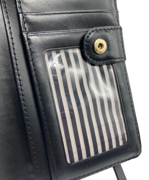 Kate Spade（ケイトスペード）Kate Spade (ケイトスペード) 2つ折り長財布 レッド×ブラックの古着・服飾アイテム