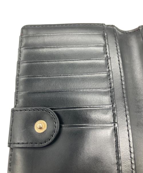 Kate Spade（ケイトスペード）Kate Spade (ケイトスペード) 2つ折り長財布 レッド×ブラックの古着・服飾アイテム