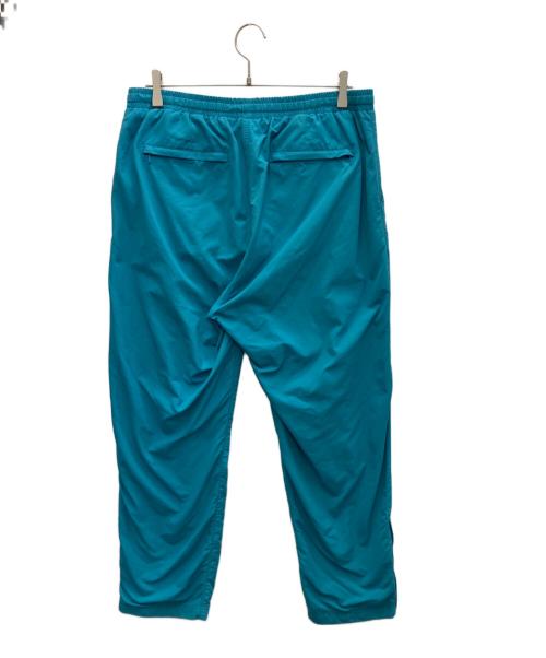 Champion（チャンピオン）Champion (チャンピオン) UNDEFEATED (アンディフィーテッド) ナイロンパンツ ブルー サイズ:XLの古着・服飾アイテム