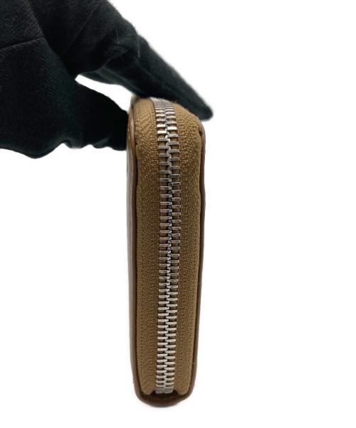 DIESEL（ディーゼル）DIESEL (ディーゼル) ラウンドファスナー長財布 ブラウンの古着・服飾アイテム