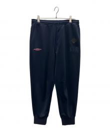 The Duffer of ST.George×UMBRO（ザ ダファーオブセントジョージ×アンブロ）の古着「トラックパンツ」｜ネイビー
