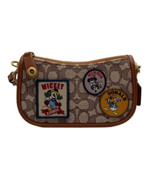 COACH（コーチ）COACH (コーチ) DISNEY (ディズニー) スウィンガー 20 シグネチャー テキスタイル ジャガードパッチ ショルダーバッグ ブラウンの古着・服飾アイテム