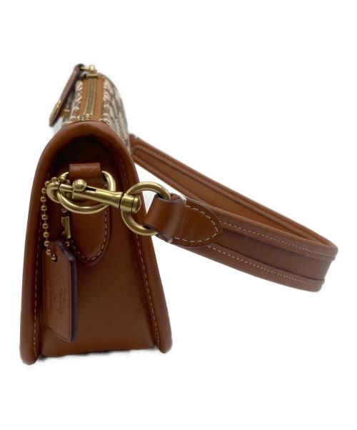 COACH（コーチ）COACH (コーチ) DISNEY (ディズニー) スウィンガー 20 シグネチャー テキスタイル ジャガードパッチ ショルダーバッグ ブラウンの古着・服飾アイテム