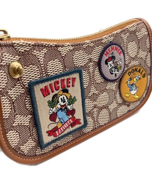 COACH（コーチ）COACH (コーチ) DISNEY (ディズニー) スウィンガー 20 シグネチャー テキスタイル ジャガードパッチ ショルダーバッグ ブラウンの古着・服飾アイテム