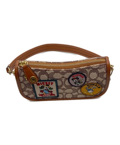 COACH（コーチ）COACH (コーチ) DISNEY (ディズニー) スウィンガー 20 シグネチャー テキスタイル ジャガードパッチ ショルダーバッグ ブラウンの古着・服飾アイテム