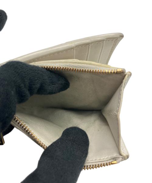 BOTTEGA VENETA（ボッテガベネタ）BOTTEGA VENETA (ボッテガベネタ) 2つ折り財布 ホワイトの古着・服飾アイテム