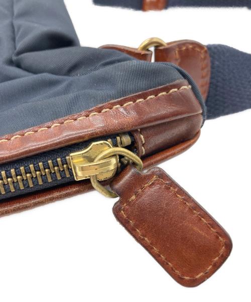 Felisi（フェリージ）Felisi (フェリージ) ショルダーバッグ ネイビー×ブラウンの古着・服飾アイテム