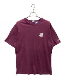 Champion×UNDEFEATED（チャンピオン×アンディフィーテッド）の古着「Tシャツ」｜パープル