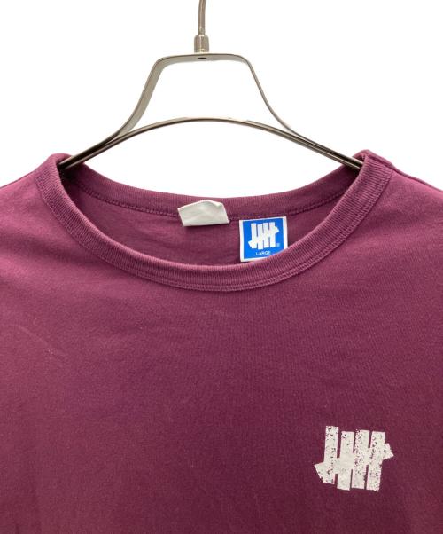 Champion（チャンピオン）Champion (チャンピオン) UNDEFEATED (アンディフィーテッド) Tシャツ パープル サイズ:Lの古着・服飾アイテム