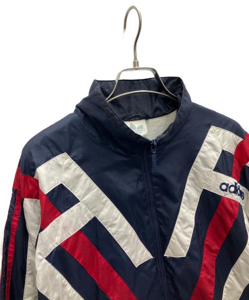 adidas（アディダス）adidas (アディダス) ウインドブレーカー ネイビー×ホワイト×レッド サイズ:Mの古着・服飾アイテム
